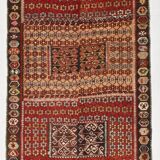 Kilim anatolien ancien tons rouges et beiges, motifs tribaux colorés