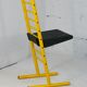 Adjustable seat chair. Circa 1980. Italy. Yellow lacquered steel.
