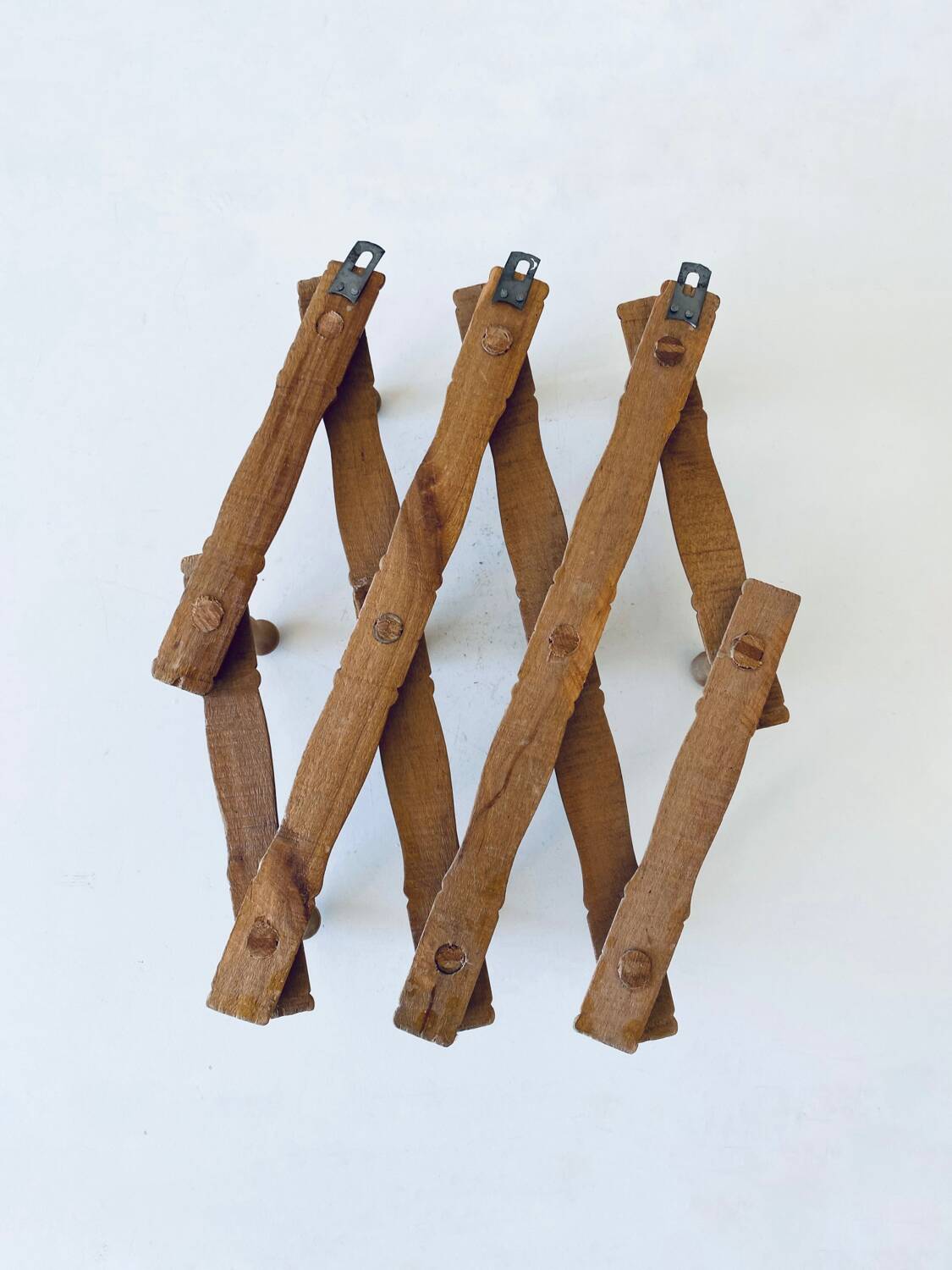 Old wooden wall coat rack