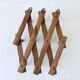 Old wooden wall coat rack