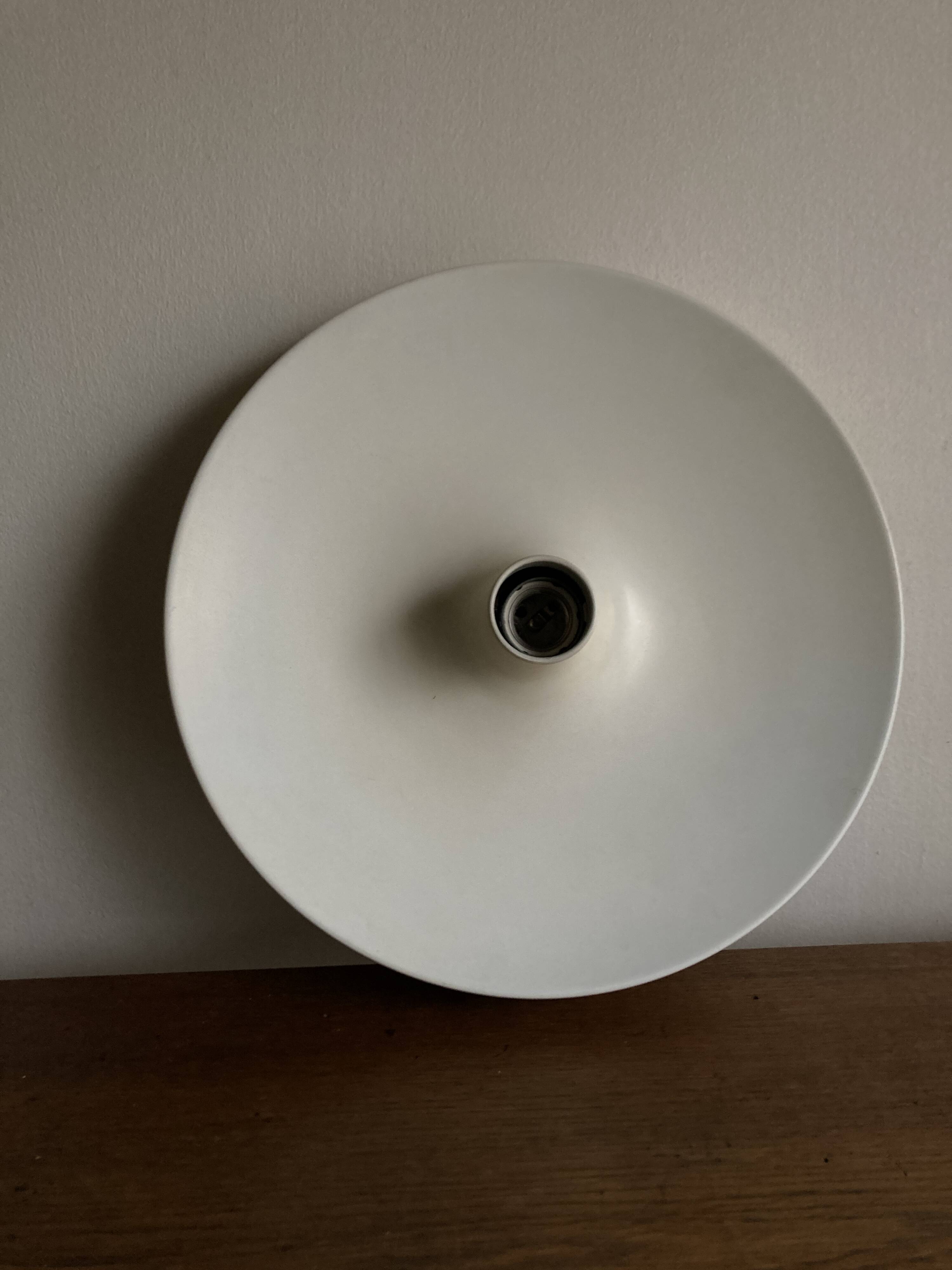 Space Age disc wall light selection by Charlotte Perriand for Les Arcs at Honsel