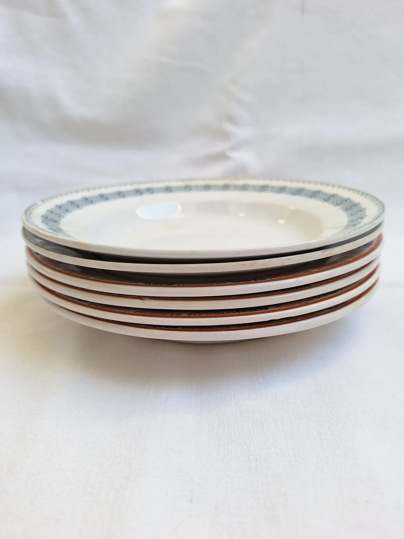 Orange and blue deep plates HBCM and St Amand