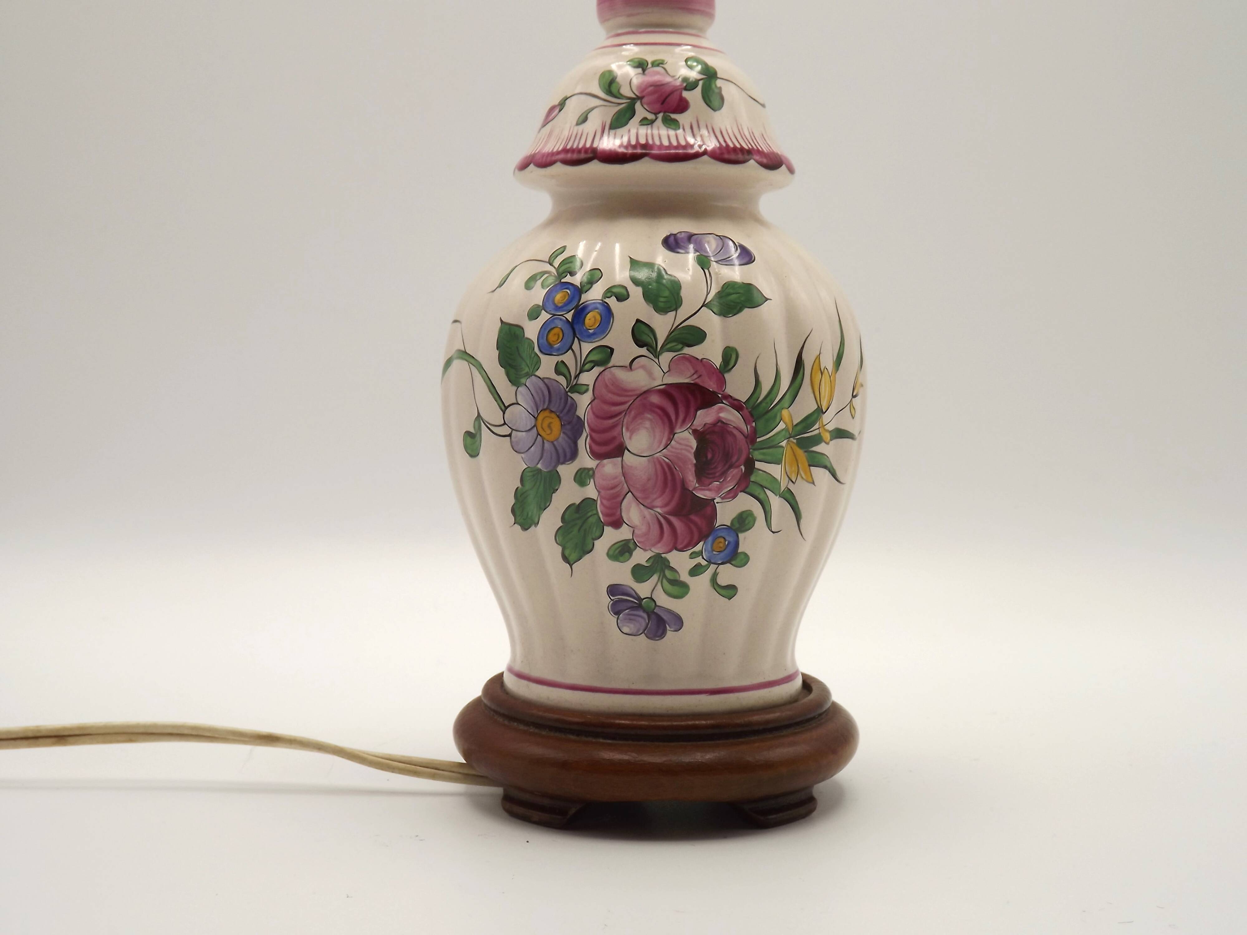 Pretty French vintage hand-painted ceramic floral lamp base on wooden plinth.