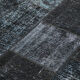 Hand-knotted turkish vintage 170 cm x 243 cm black patchwork rug
