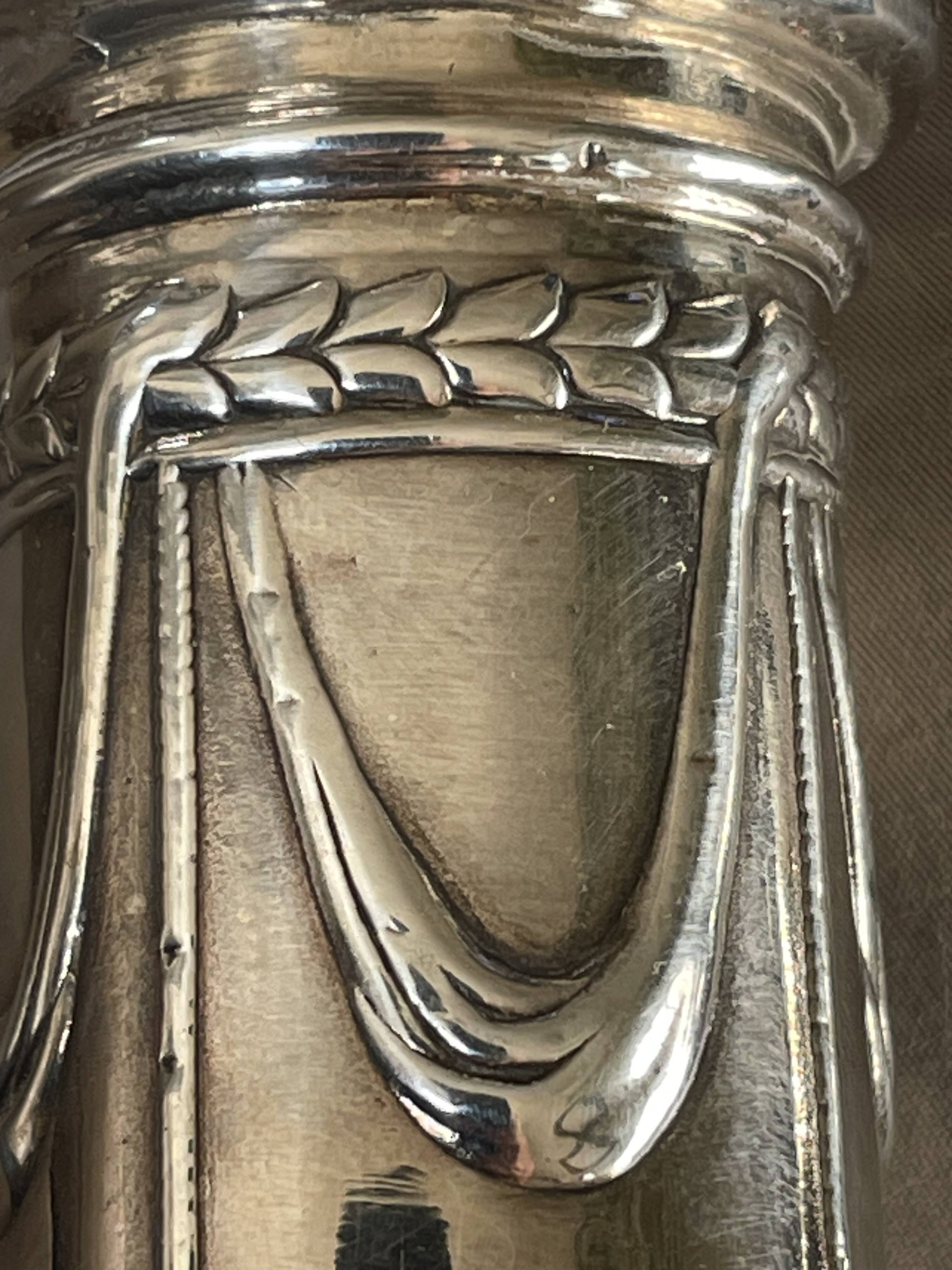 pair of Victorian style silver-plated candlesticks