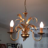 Vintage chandelier in golden metal