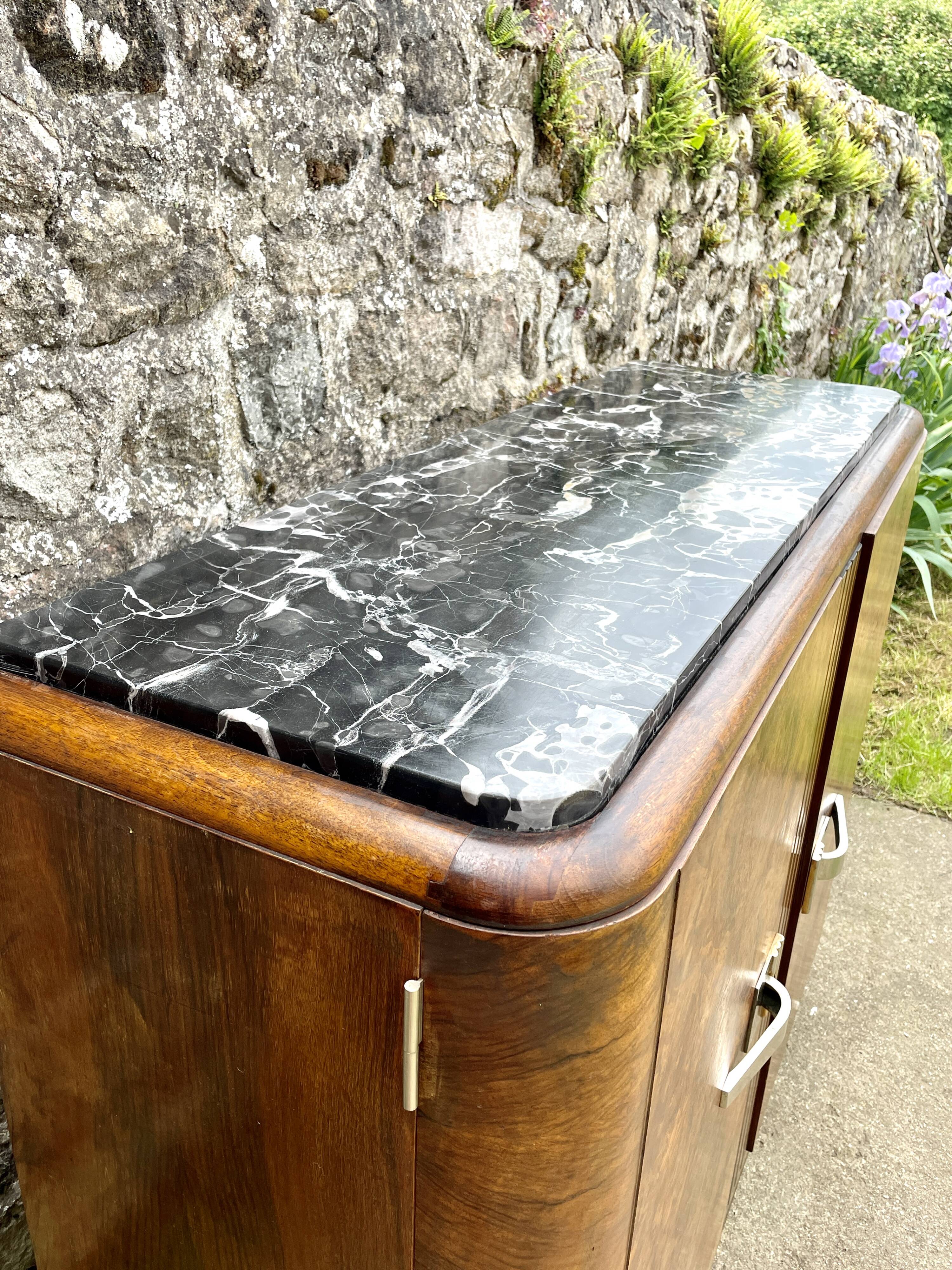 Low sideboard in black marble, Art Deco, 1930s