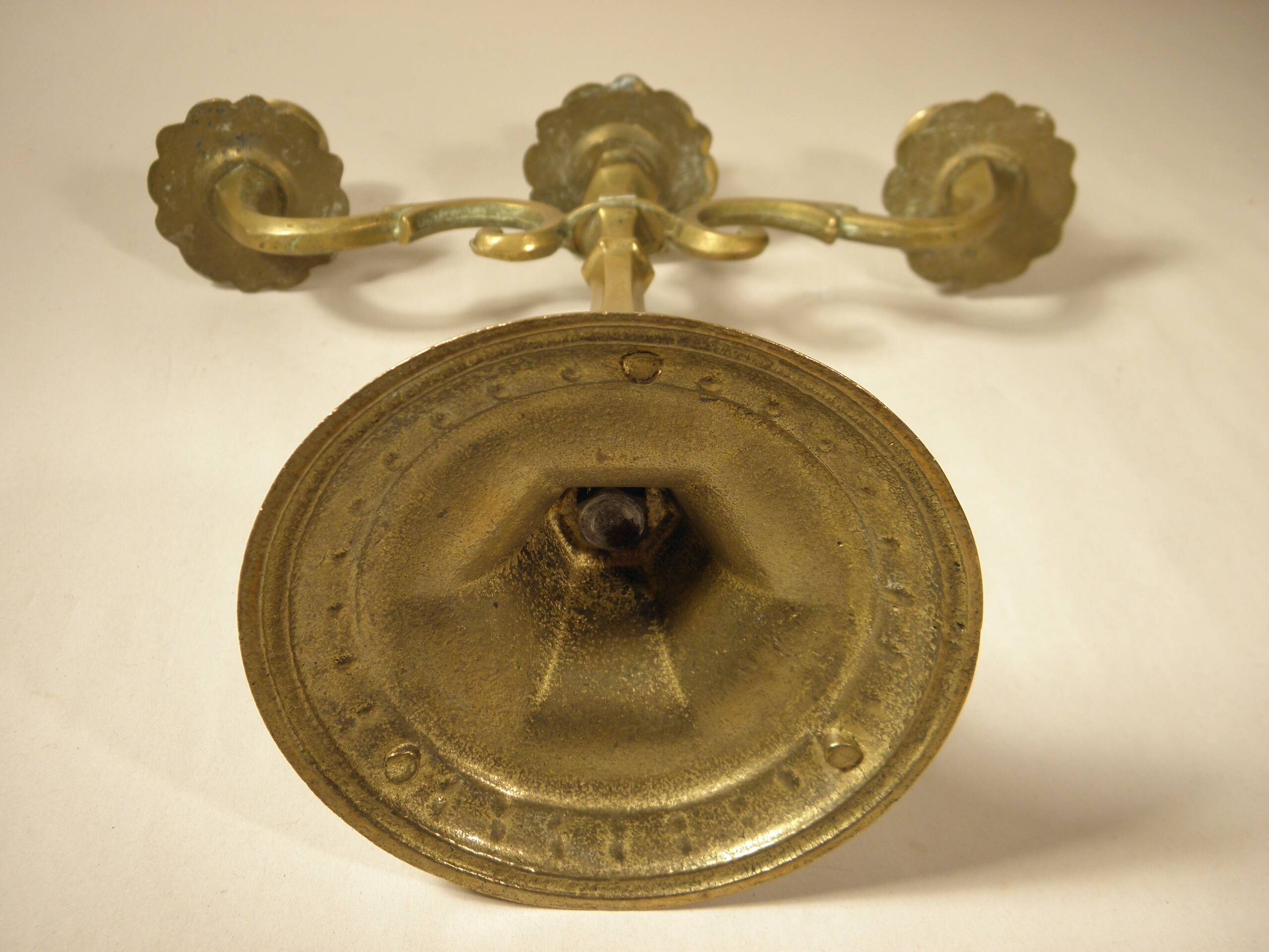 Three-light brass candlestick