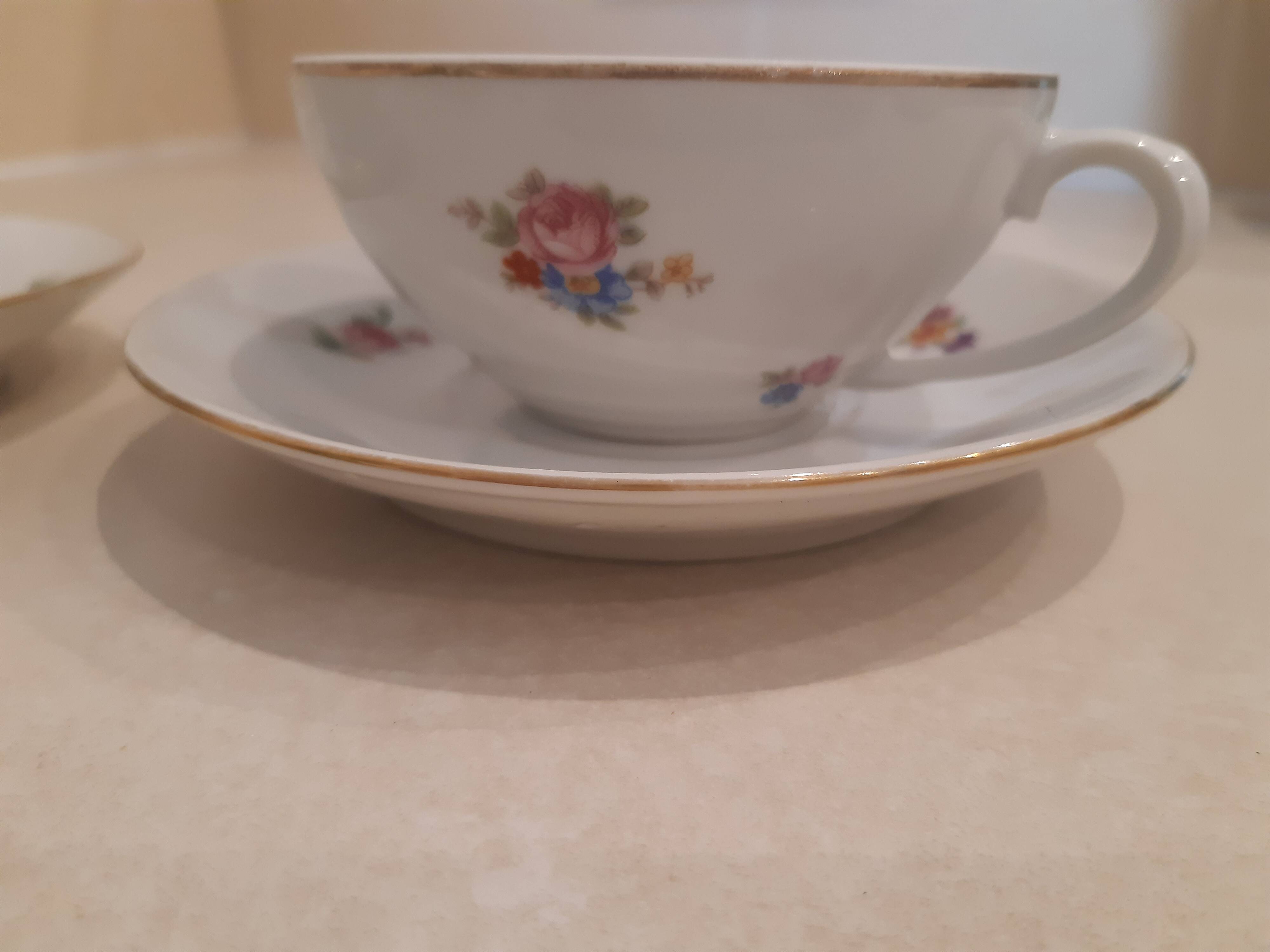 Breakfast set in white porcelain with floral decoration, 1930s.