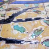 Coffee table with ceramics by Charles Emile Pinson, circa 1958.