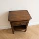 Table de chevet ancienne en bois massif