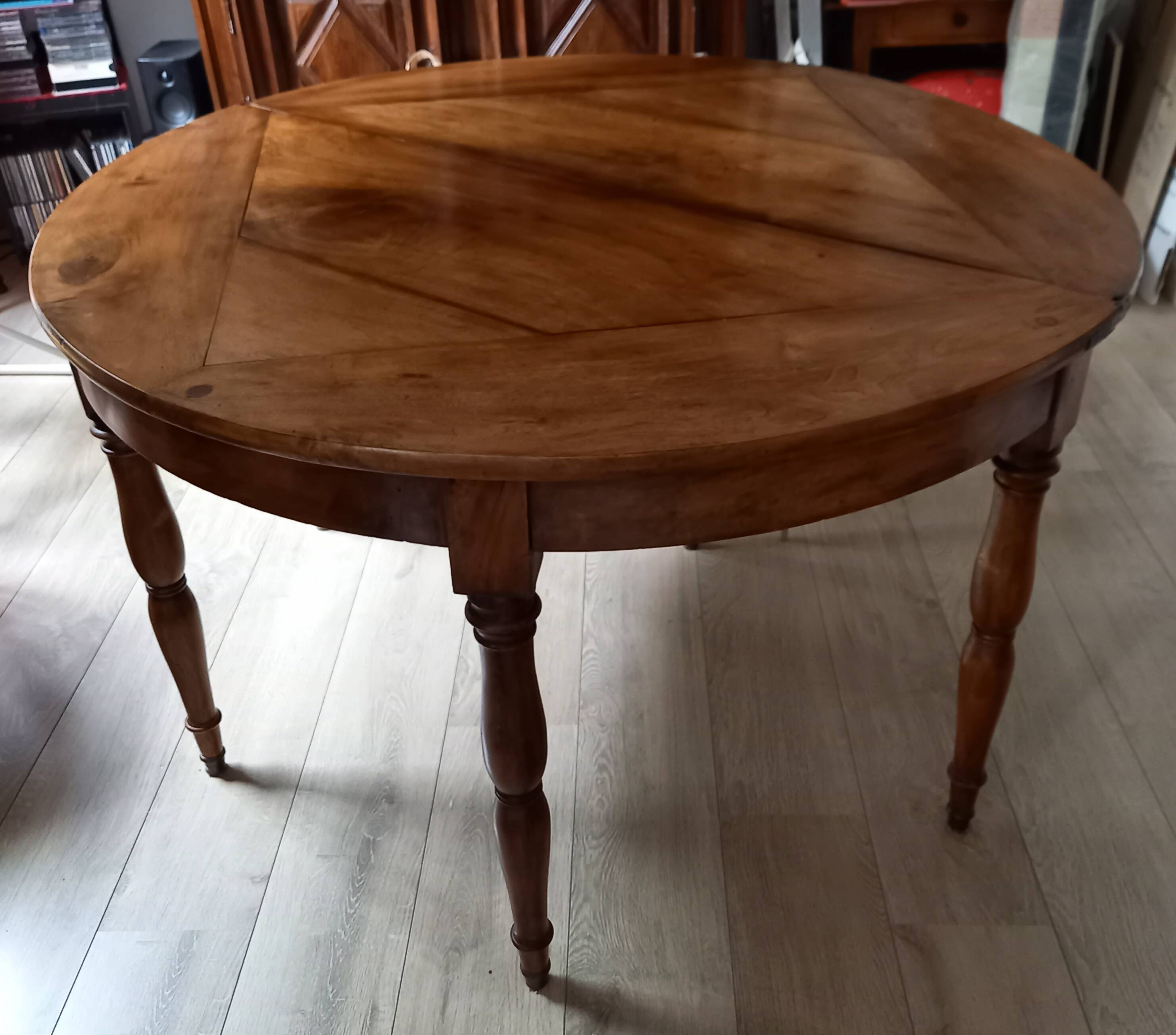 Antique half-moon walnut round table