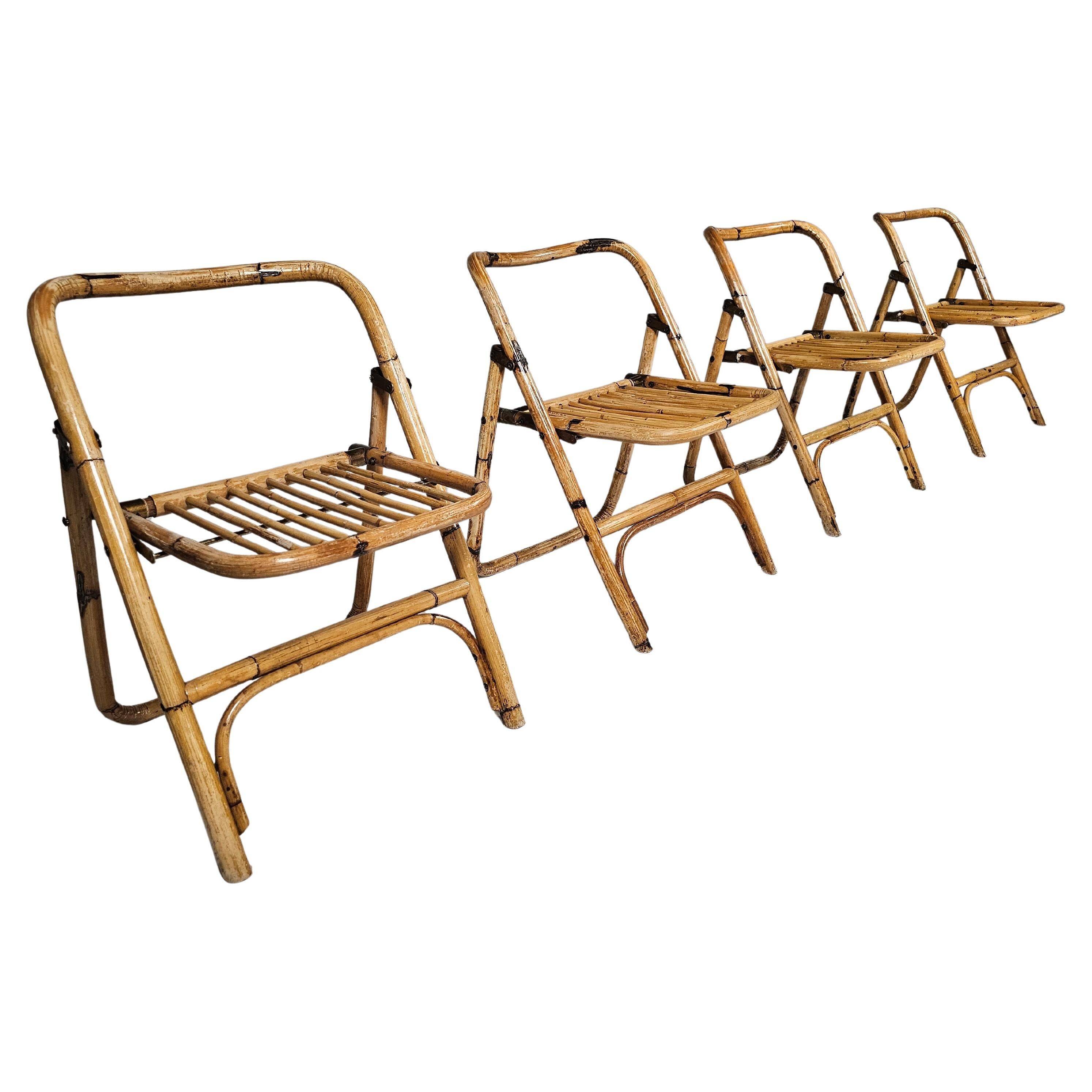 Set of 4 Dal Vera bamboo folding chairs, brass details, Italy, 1960s.