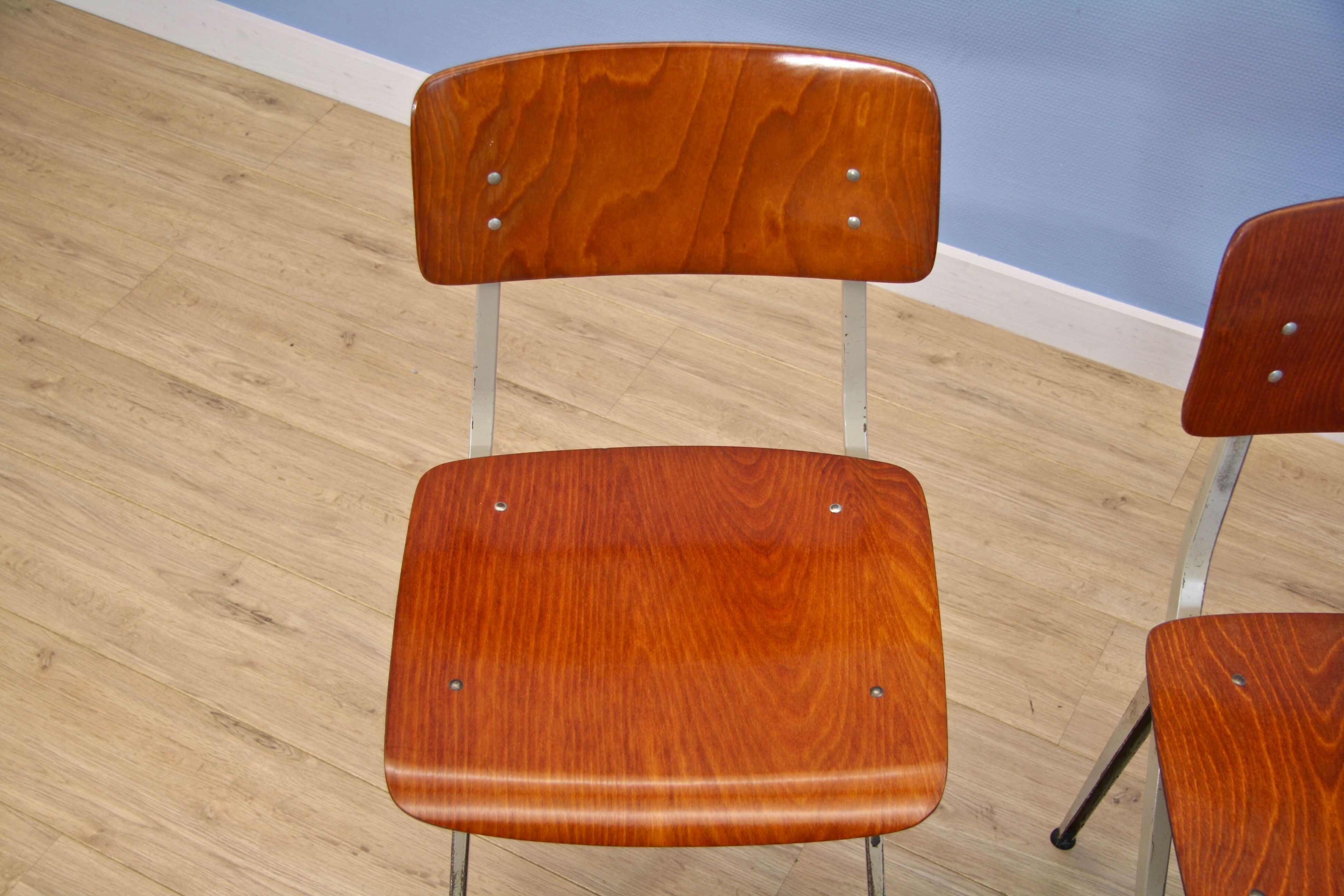 Set of 2 Dutch industrial chairs in teak/plywood by Marko, 1960s