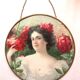 Round wall medallion frame, engraving of a woman with red roses, Art Deco