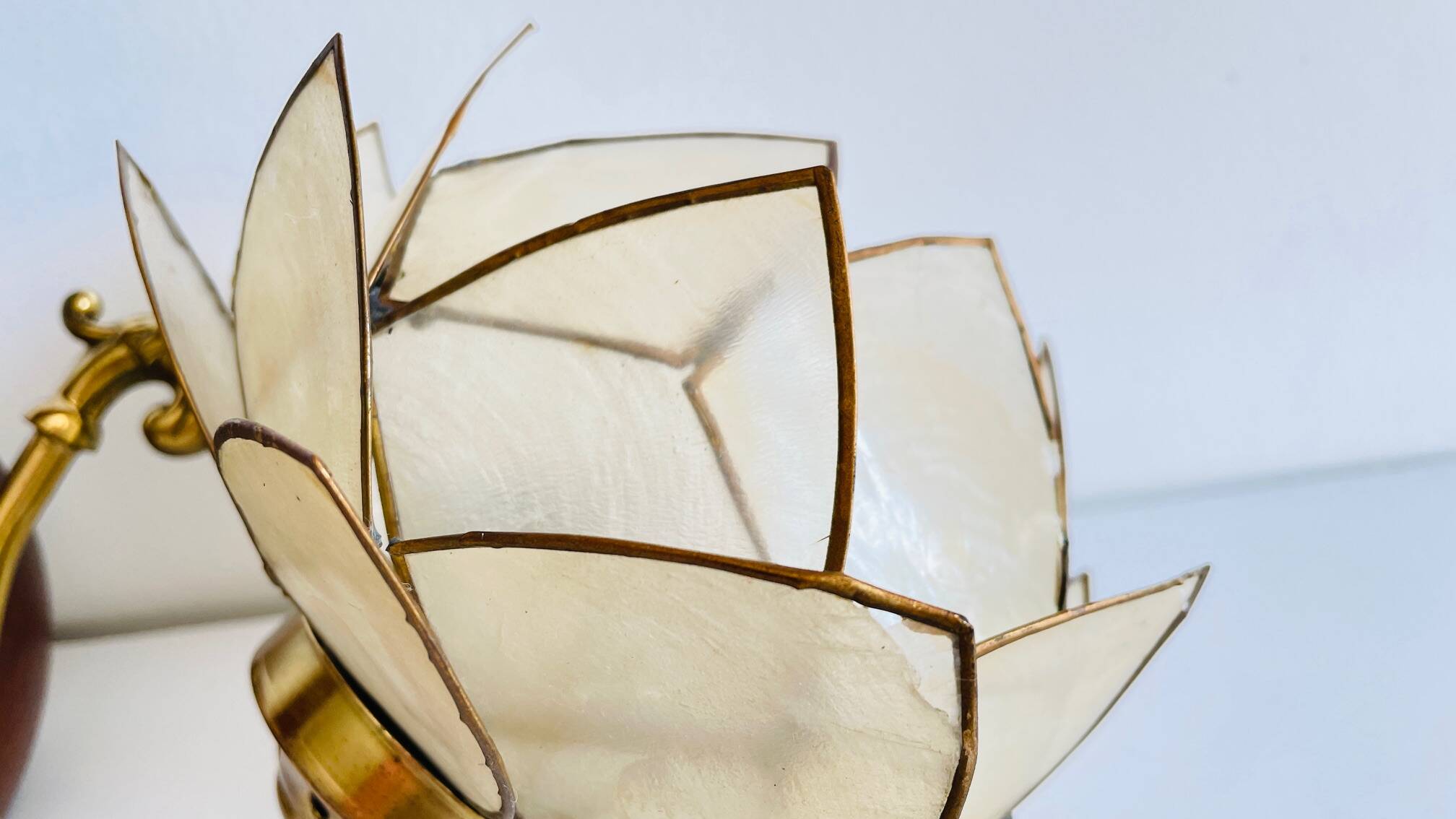 Vintage mother-of-pearl and brass flower wall light