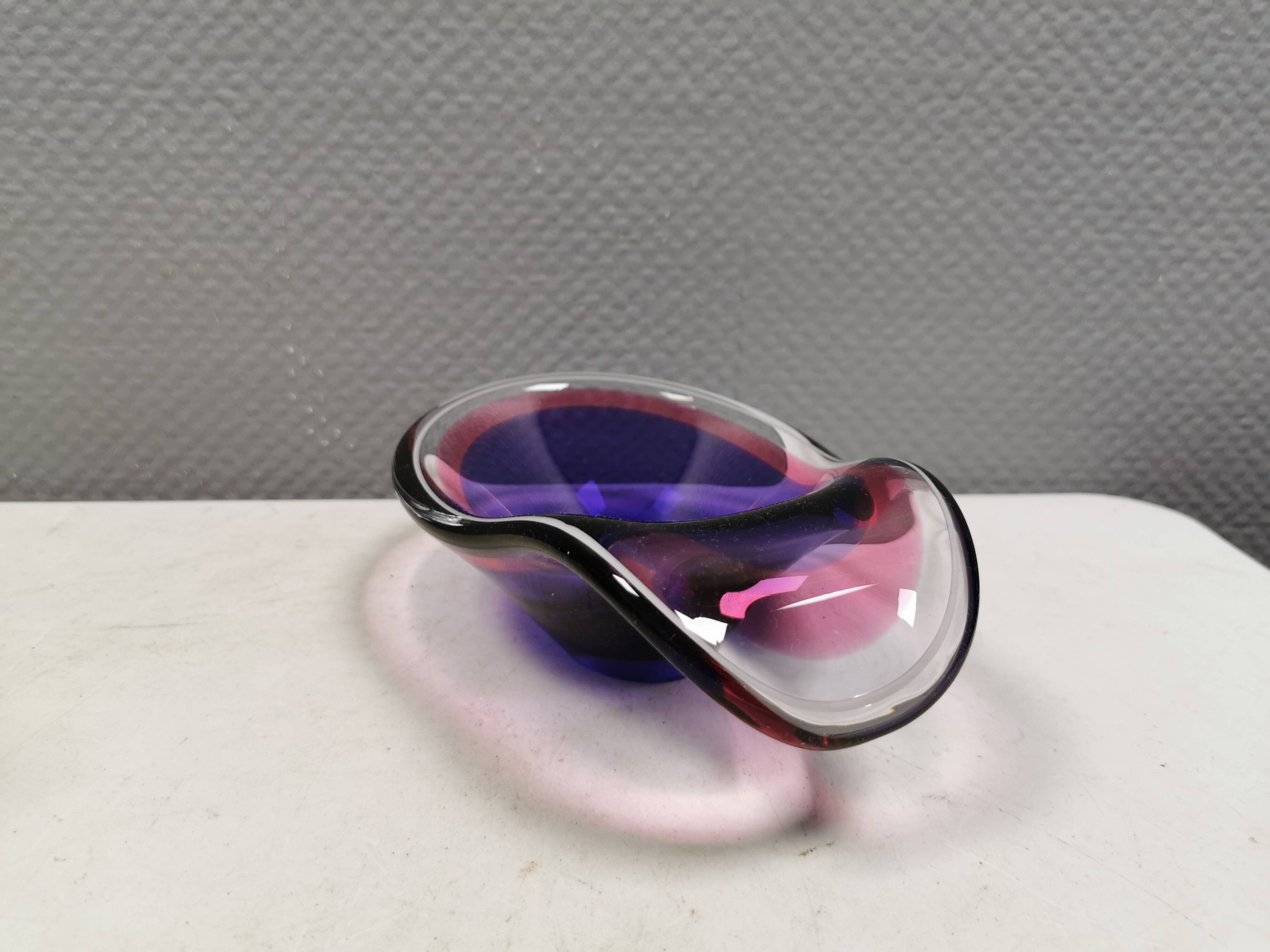 Beautiful dish/bowl in many coloured glass.