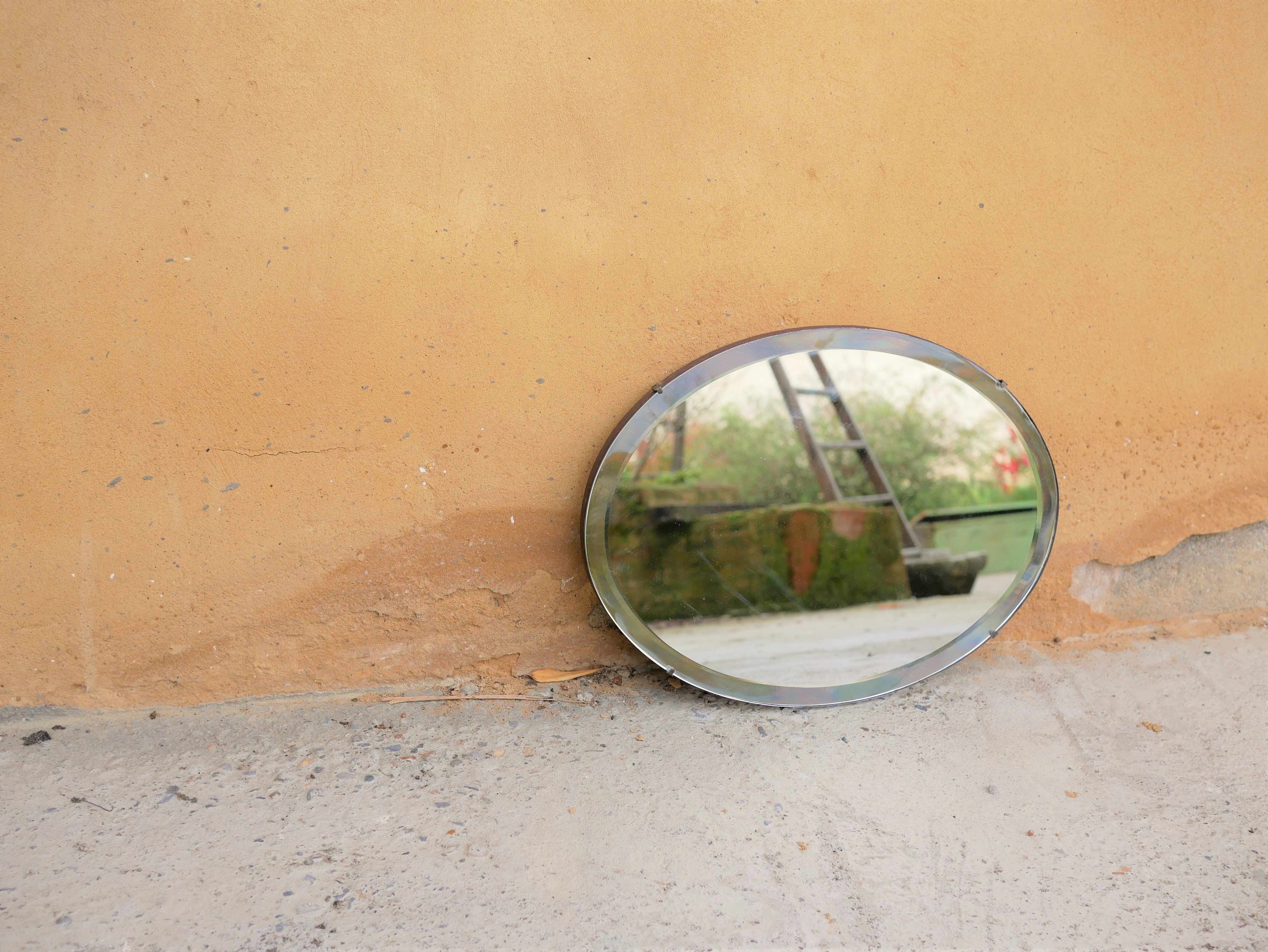 Vintage art deco bevelled oval mirror