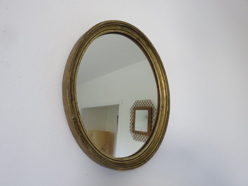 Old oval mirror in gilded wood 50s 60s