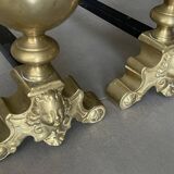 Paire de chenets en laiton et fonte, décor de marmousets, style louis xiv