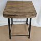Old workshop stool in wood + wrought iron