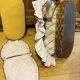 1960s wicker cradle with mattress and drapes.