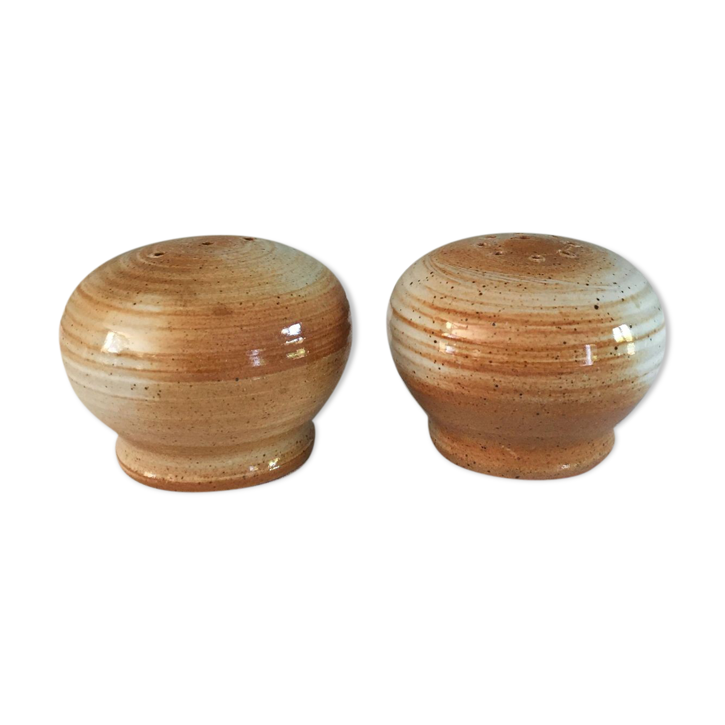 Vintage salt and pepper shaker in sandstone