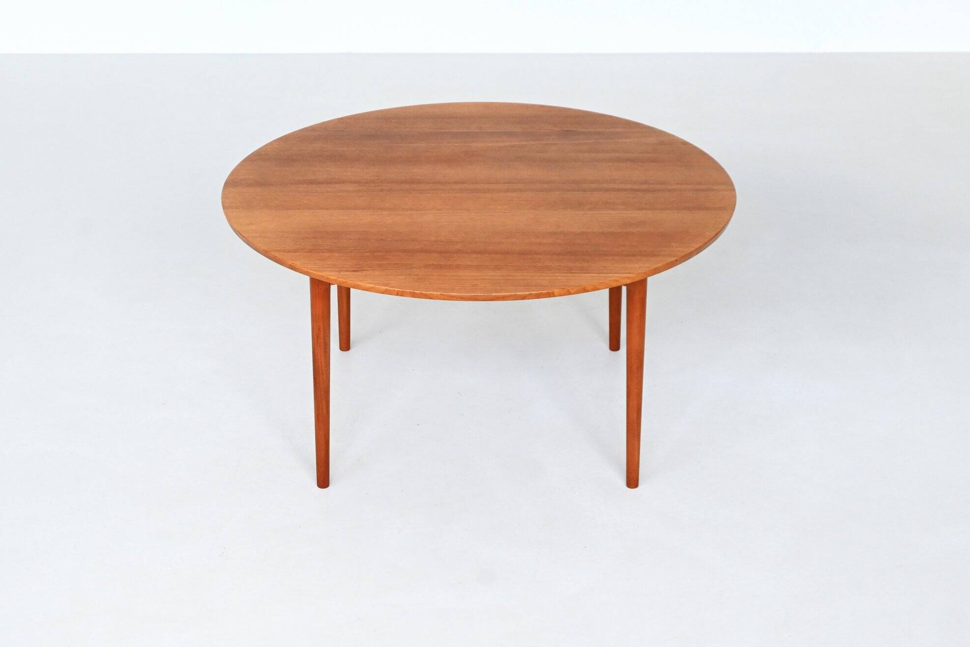 France & Son round dining table in teak Cado Denmark 1960