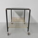 Vintage coffee table on castors with singles rack