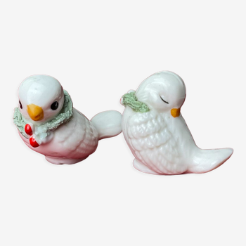 Pair of miniature white birds in ancient ceramics