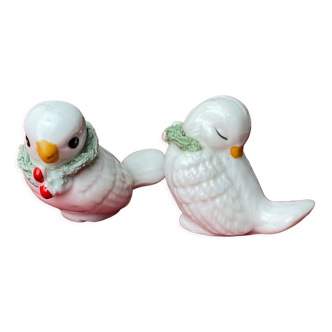 Pair of miniature white birds in ancient ceramics