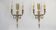 Bronze double-walled appliques with eagle head, arrow and quiver in vintage French Empire style.