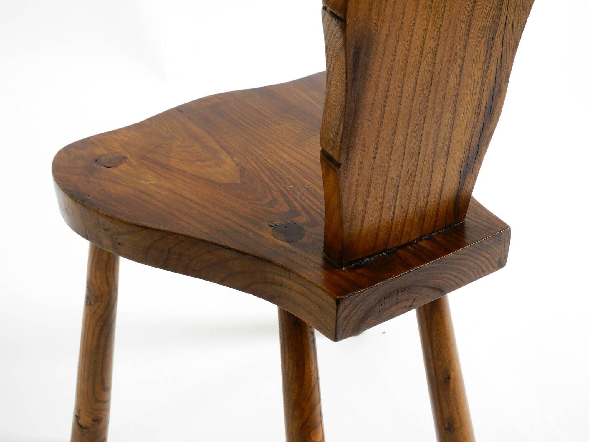 Solid wood chair with an ornate, hand-carved backrest – Made in Spain