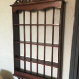Carved wooden wall shelf for collection or other.