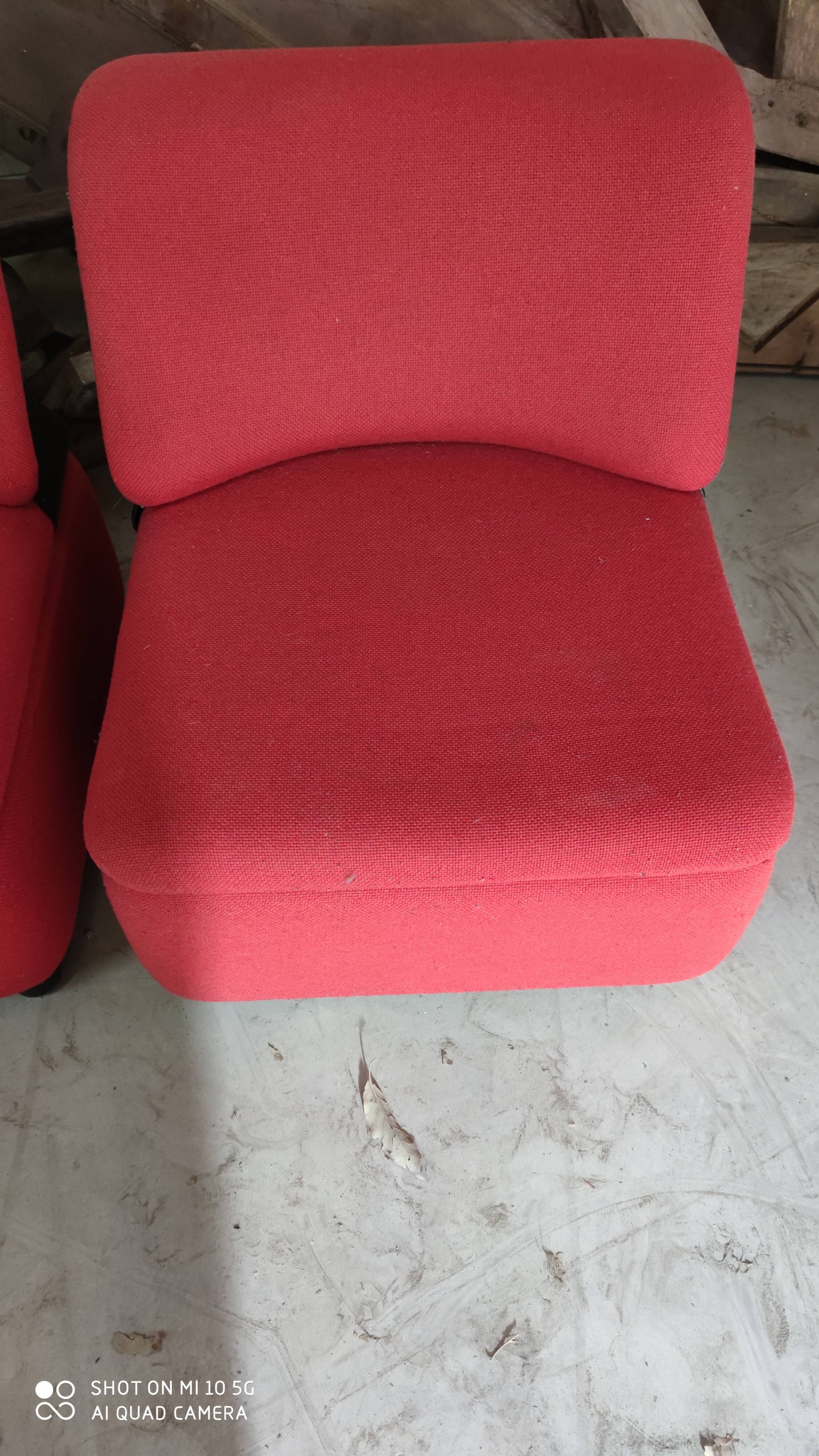 Pair of lounge chairs in red tweed and black vinyl