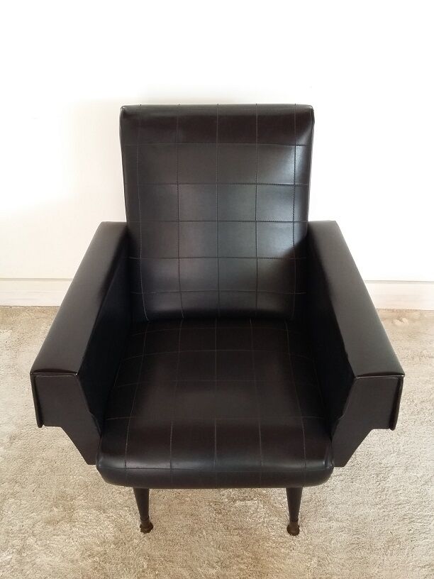 Black armchair of the 1950s