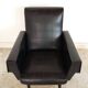 Black armchair of the 1950s