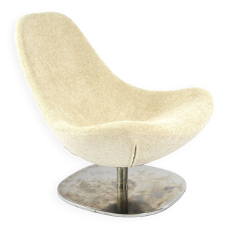 Light beige shell swivel armchair