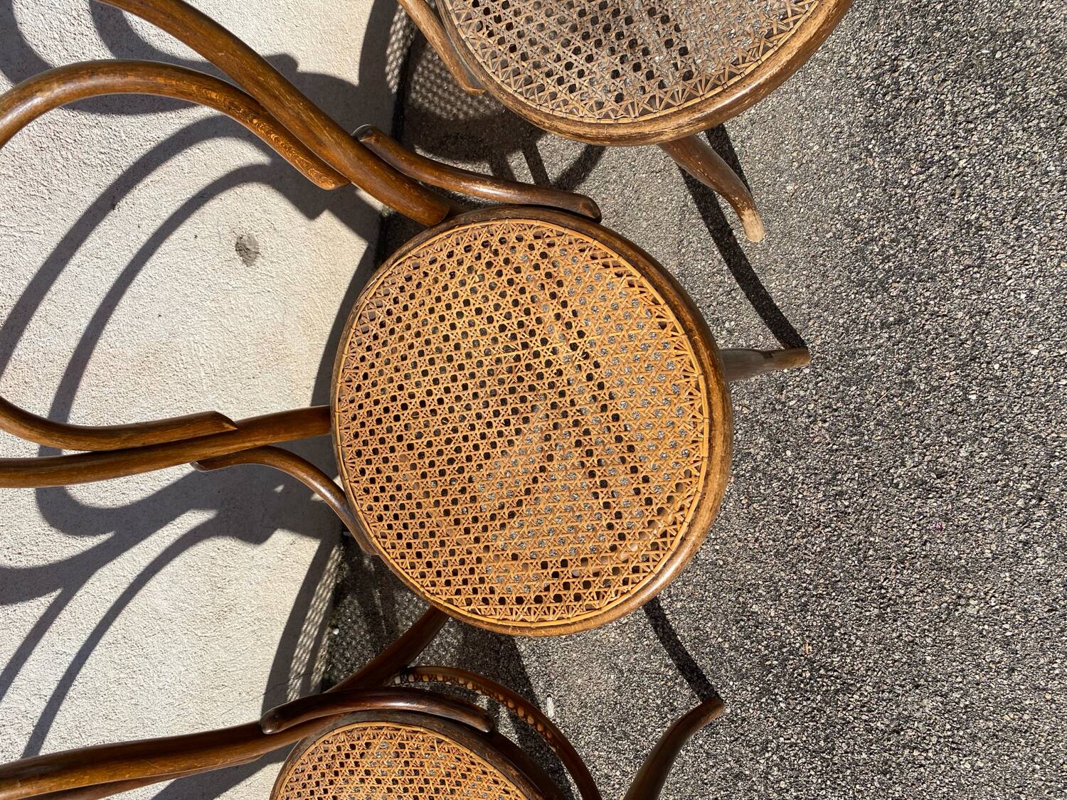 Set of 4 wooden and cane bistro chairs