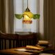 Opaline pleated suspension and tulip with Art Deco floral patterns.