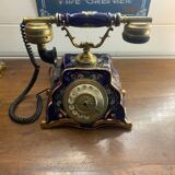 Téléphone de maison en porcelaine doré début XXeme