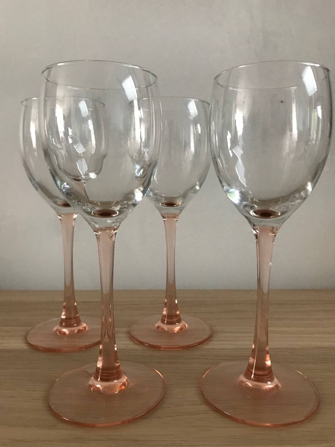 4 luminarc wine glasses with pink base