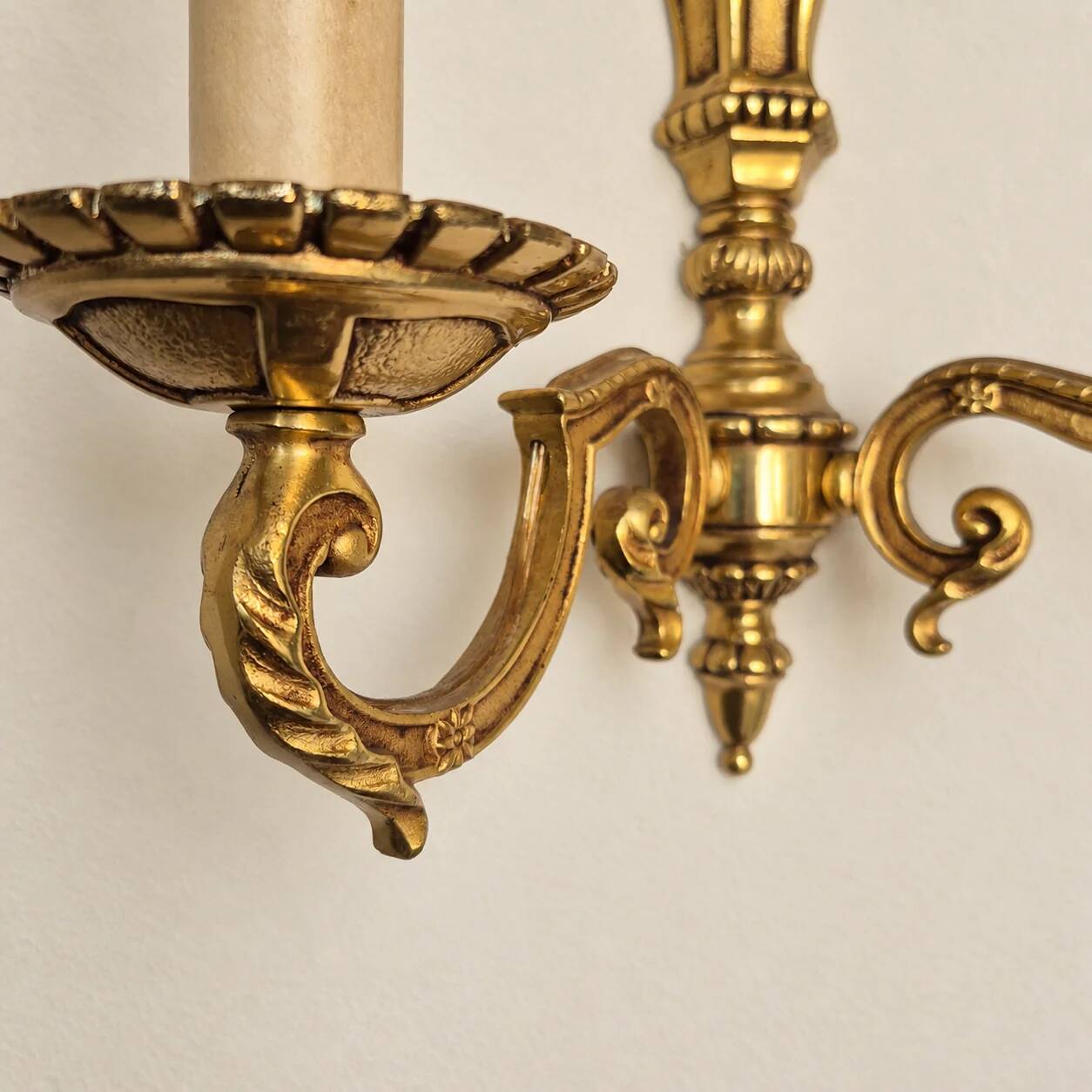 Set of four two-light wall sconces in gilded brass — Louis XVI style