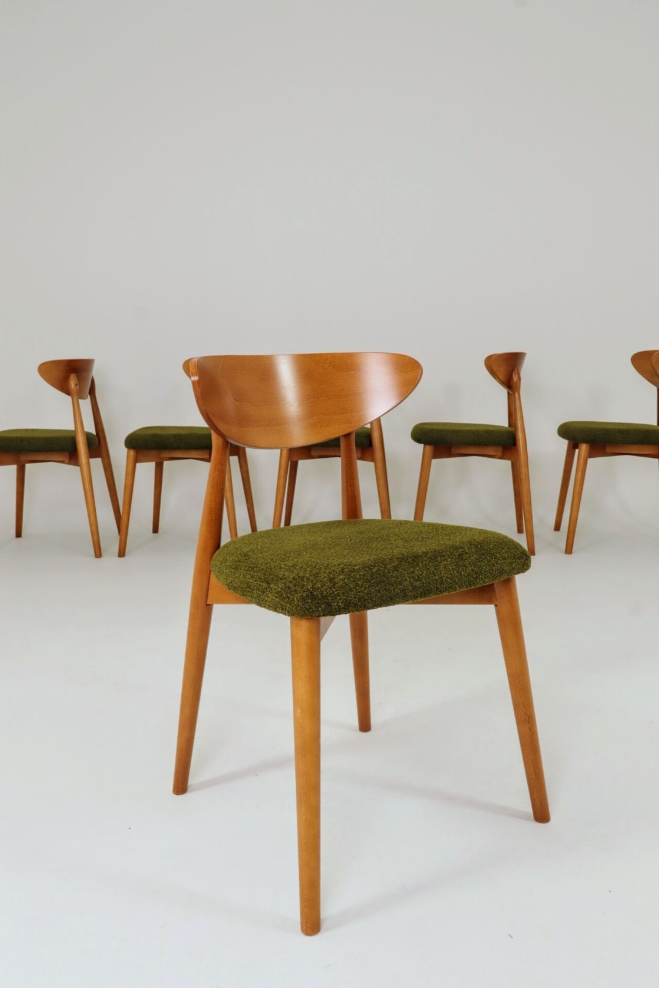 Wild green dining chairs light wood
