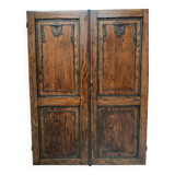 Double portes de placards en chene sculpté XX siècle
