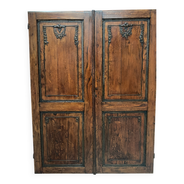 Double cupboard doors in carved oak, 20th century