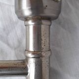 Wall lamp with articulated arm