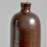 Enamelled brown sandstone bottle with handle