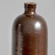 Bouteille en grès marron émaillé avec anse