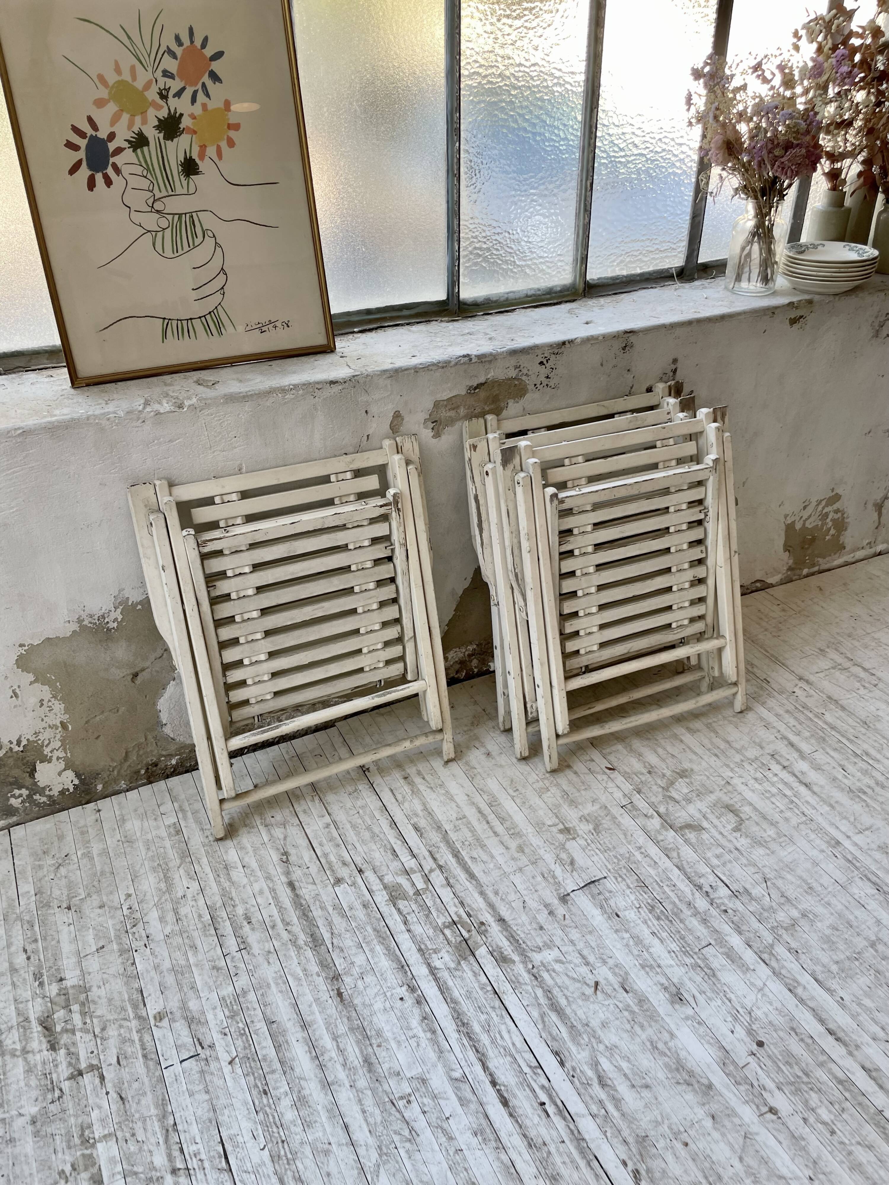 4 white wooden garden chairs